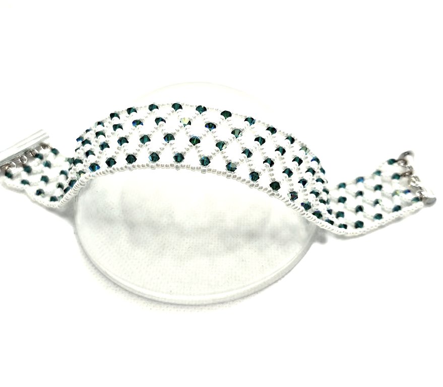 White seed bead netted cuff style bracelet with green Swarovski crystals