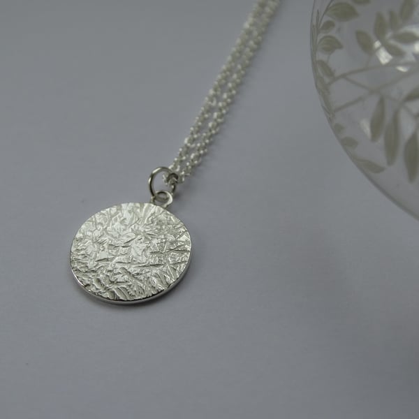 Silver disc pendant - Winter Solstice - textured recycled sterling silver