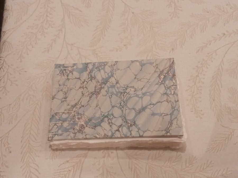 A5 Landscape sketchbook with cotton rag paper and printed marble cover. 