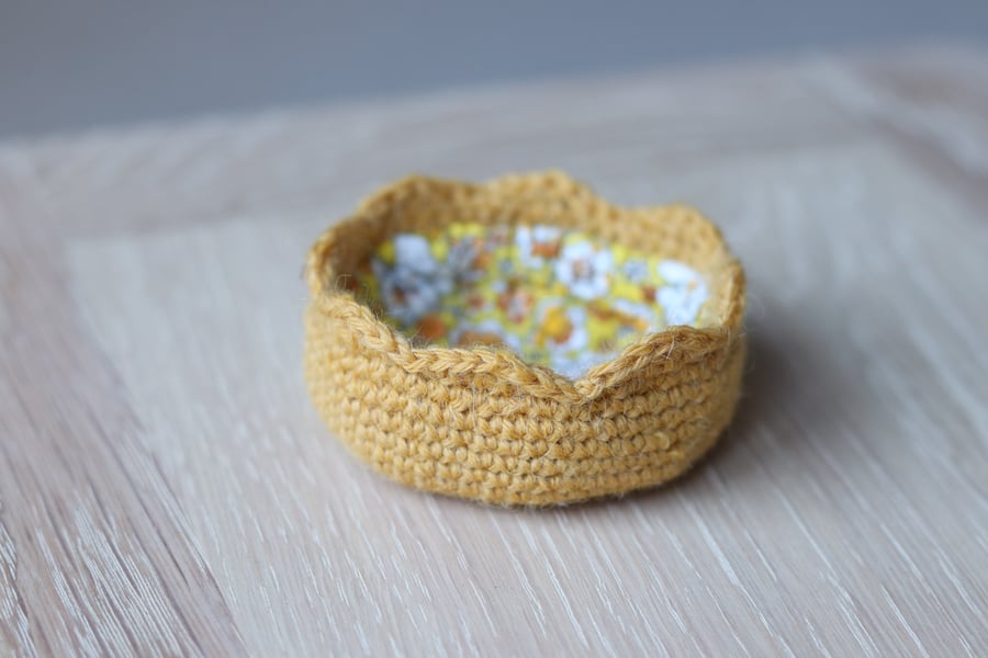 Yellow crochet storage pot