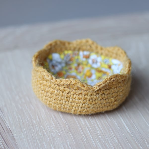 Yellow crochet storage pot