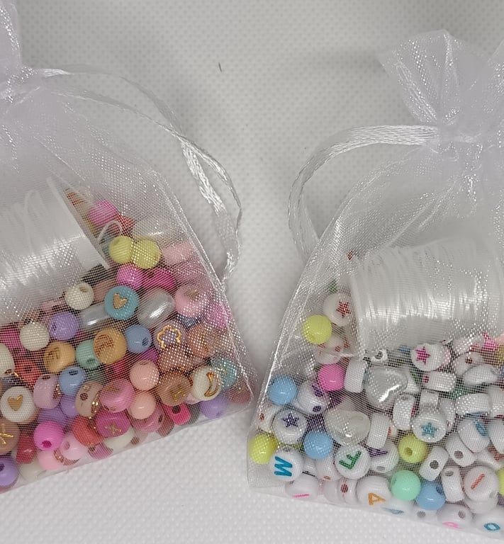 Small bracelet making kit including alphabet beads and many decorative beads