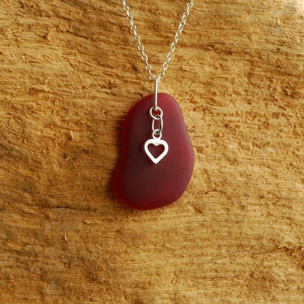 Red beach glass pendant with silver heart