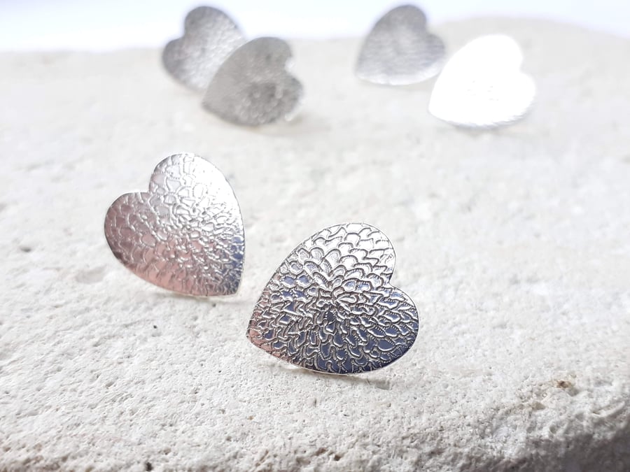 Heart Shaped sterling silver Stud Earrings with a Hand Engraved Chrysanthemum
