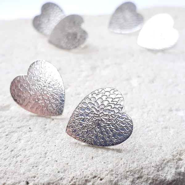 Heart Shaped sterling silver Stud Earrings with a Hand Engraved Chrysanthemum