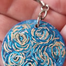 Hand painted wooden keyrings (swirls and sparks)