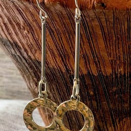 Hammered loop earrings on long bar pin.