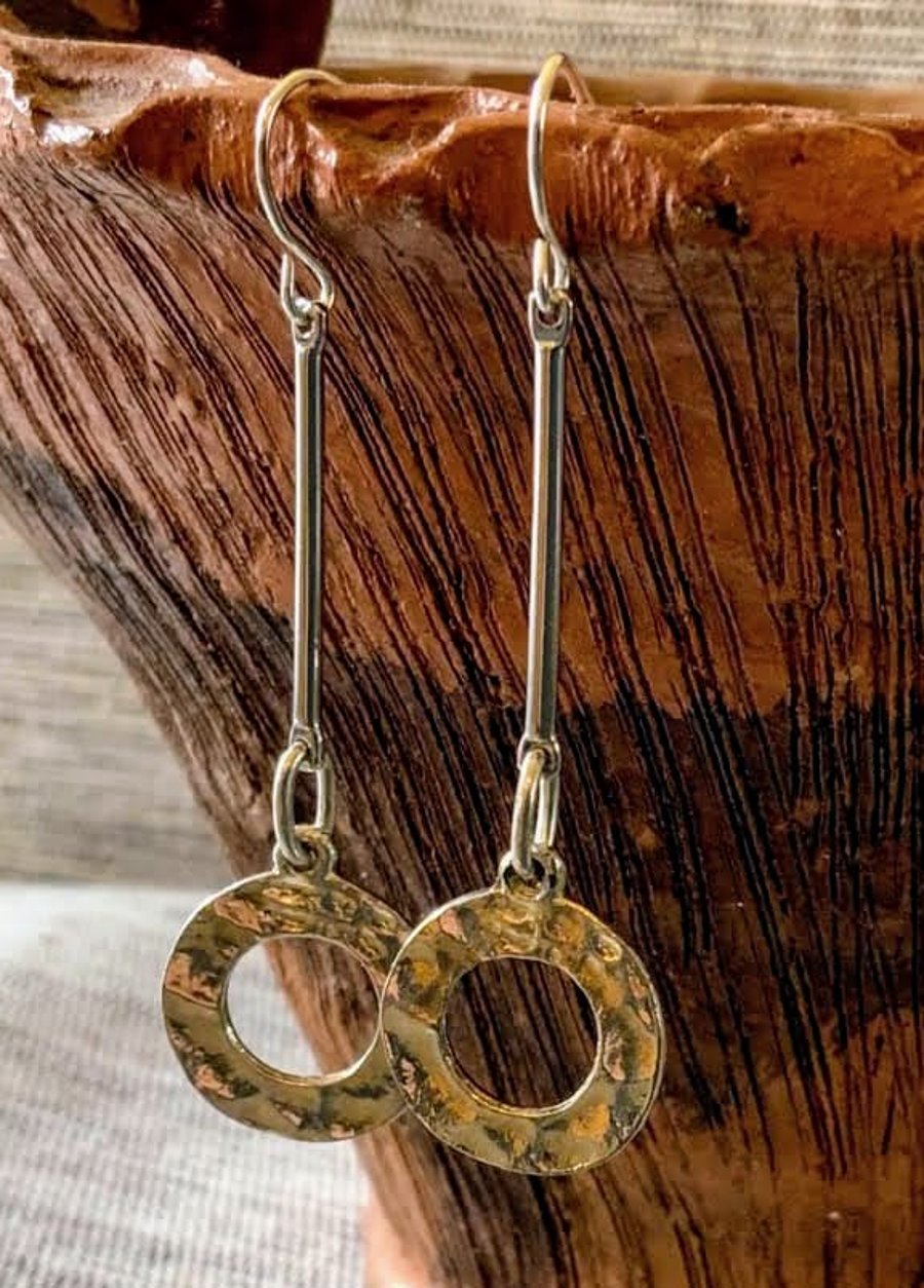 Hammered loop earrings on long bar pin.
