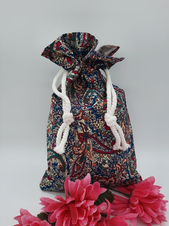 Wash bag in teal and cherry pattern fabric. Sale