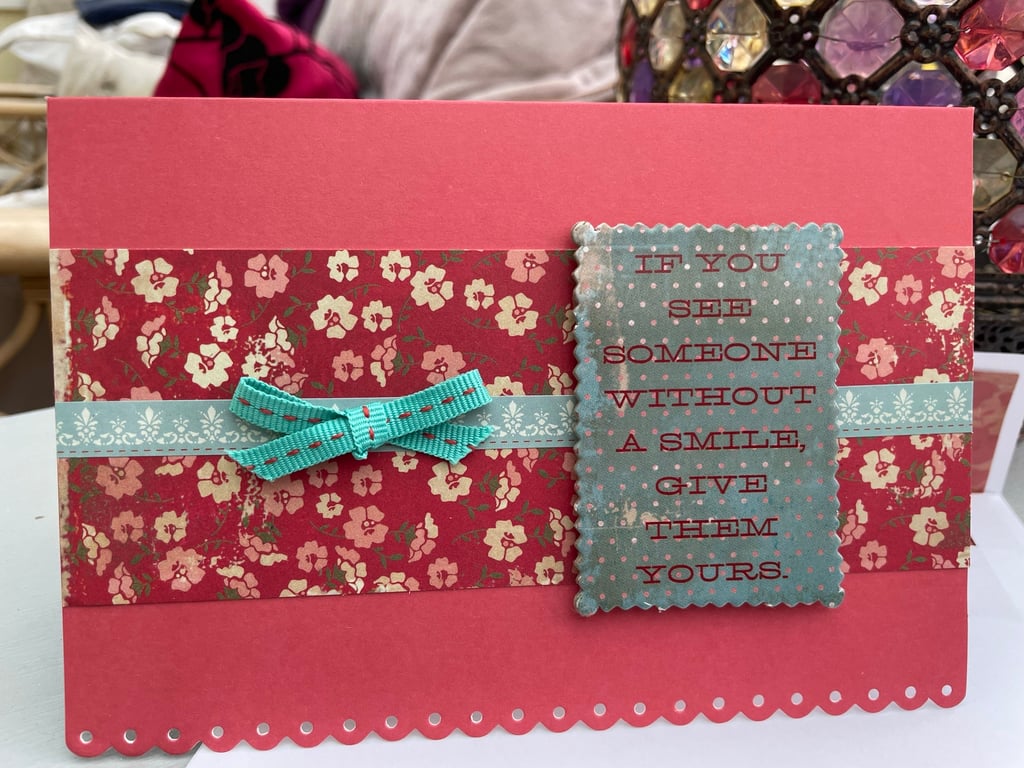 Give someone a smile floral greetings card