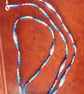 Long Summer Swirl Beaded Necklace in shades of blue with handmade paper beads - Image 7
