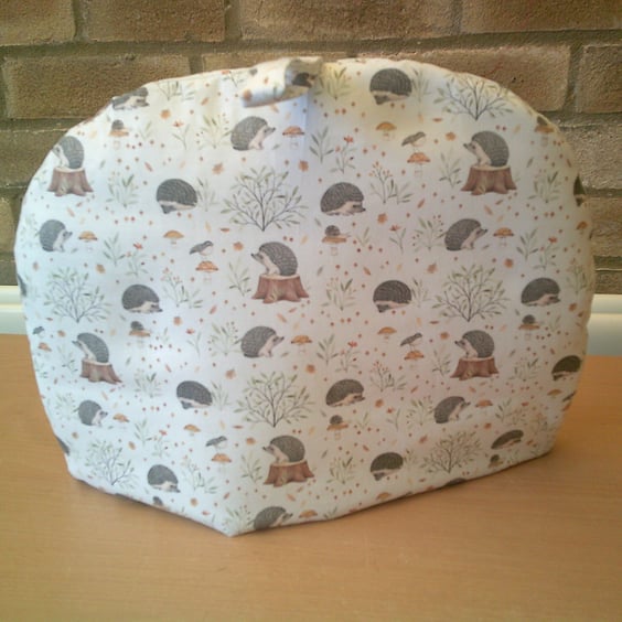 Large Teacosy with Hedgehogs on Tree Stumps