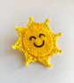 Smiling sun brooch 