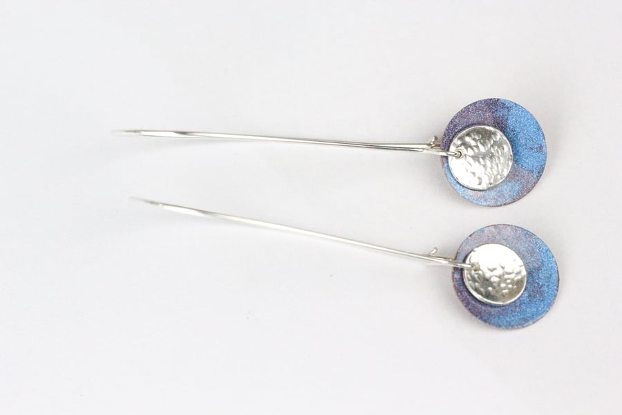 Long sterling silver hoop earrings with galaxy coloured discs