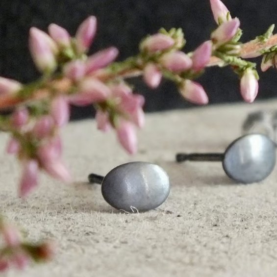 Dark oval stud earrings; minimal everyday silver studs
