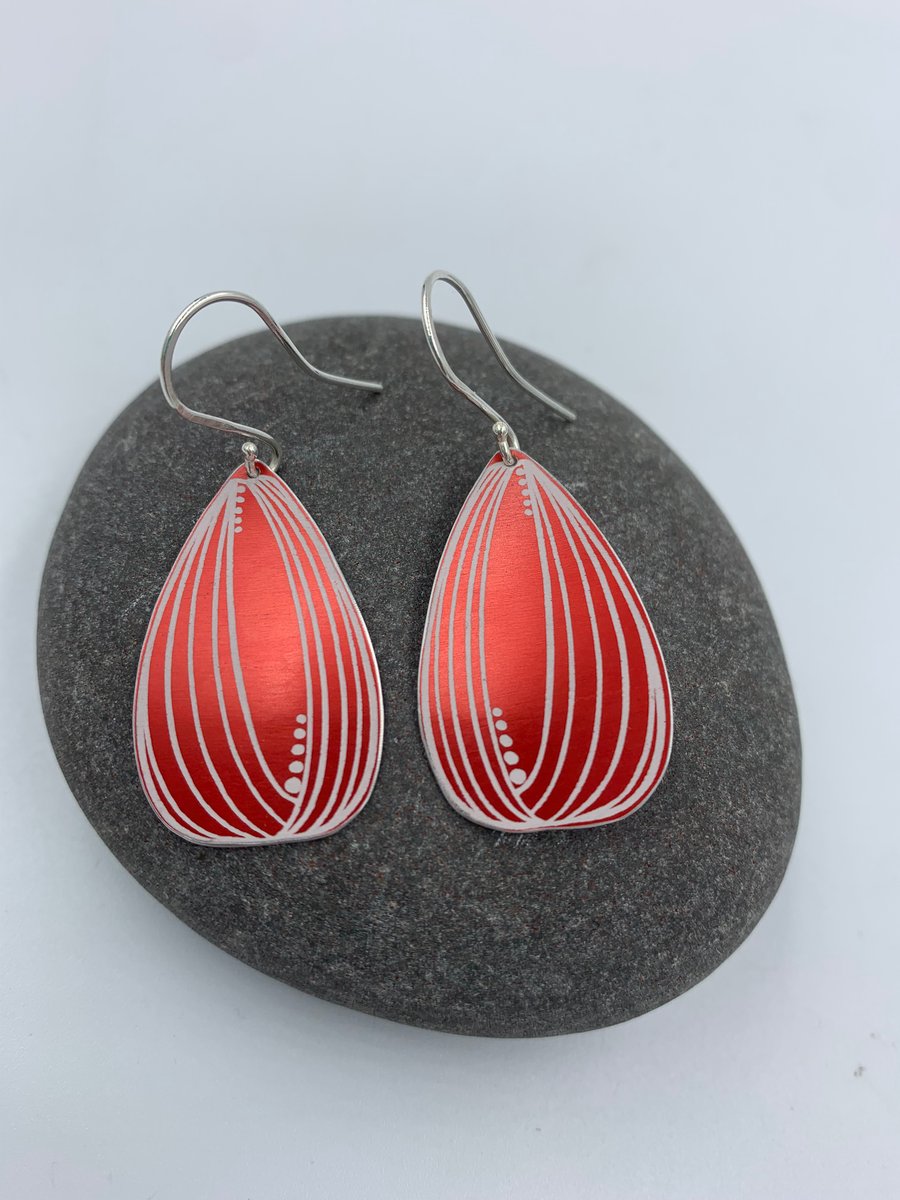 Large red aluminium tulip dangly earrings