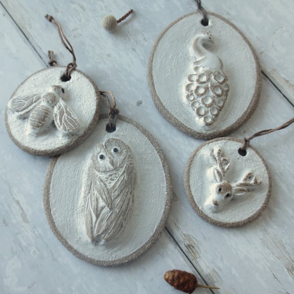 Hand-built stoneware small animal wall plaque ornament in white