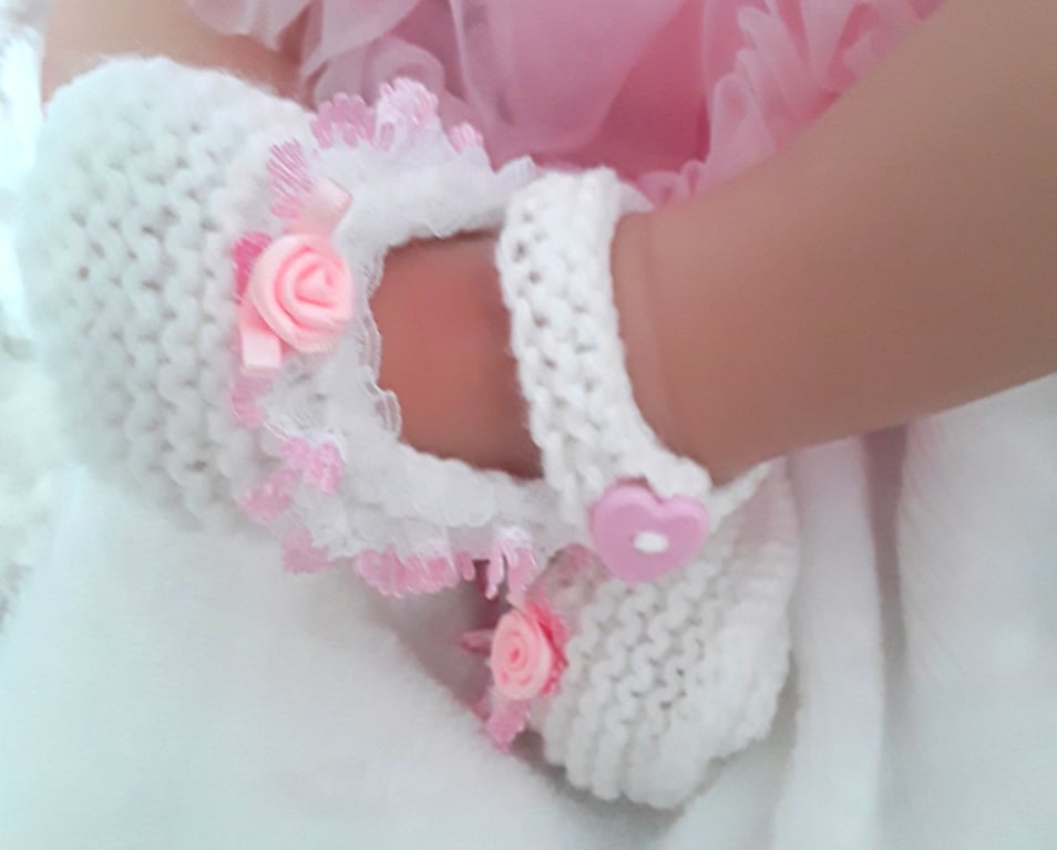 Knitted white baby girl booties Mary Jane shoes 