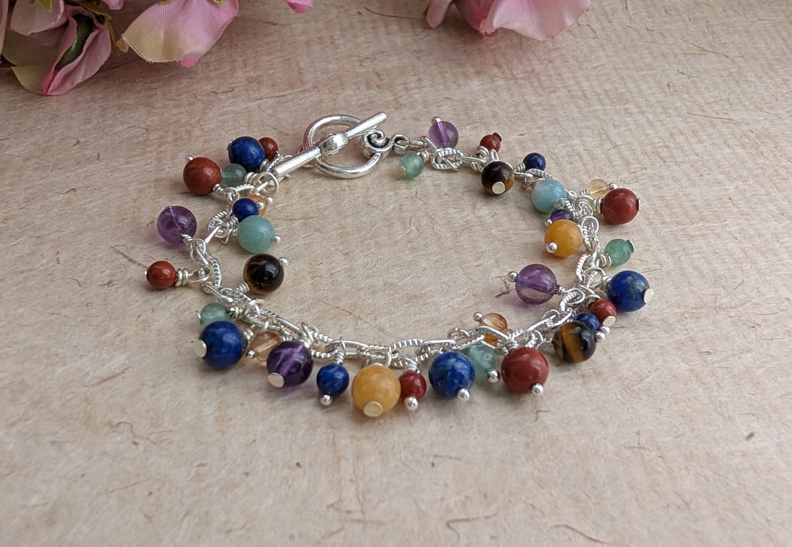 Chakra gemstone charm style bracelet with toggle clasp 
