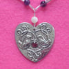 Reserved for Caroline.Love birds garnet necklace in silver pewter