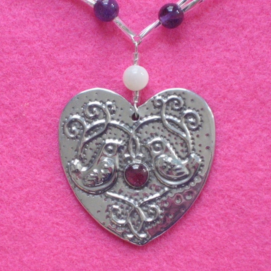 Reserved for Caroline.Love birds garnet necklace in silver pewter