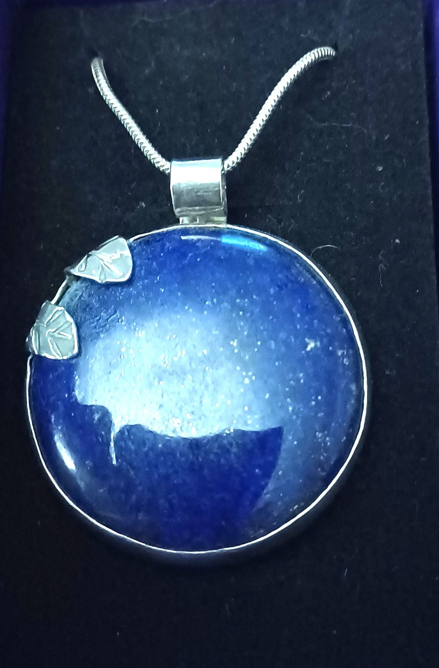 Silver and lapis hidden bird pendant
