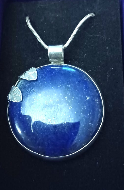 Silver and lapis hidden bird pendant