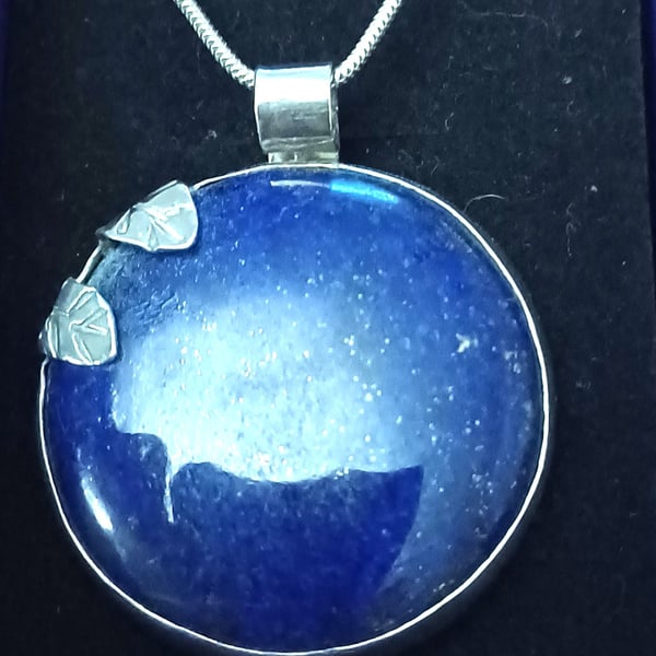 Silver and lapis hidden bird pendant