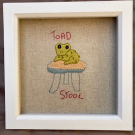 Framed "Toadstool" hand embroidered picture.