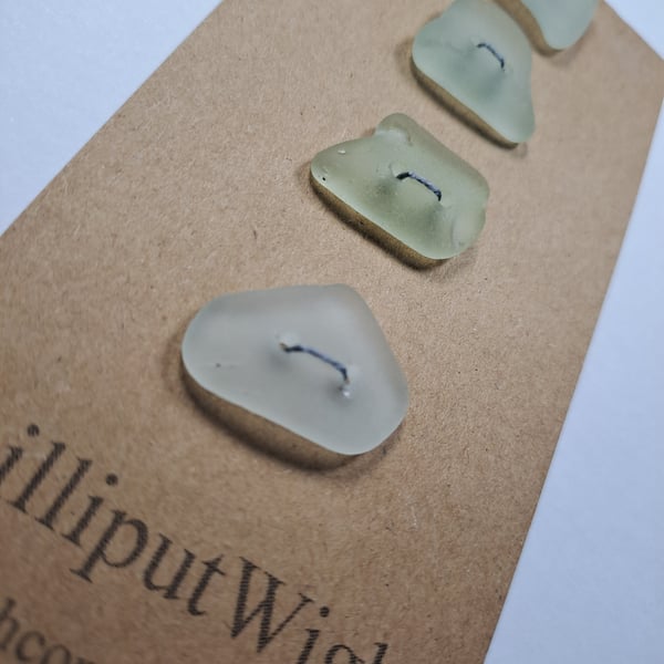 Set of four frosted sea glass buttons