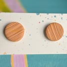 Orange textured thin line large stud earrings. 