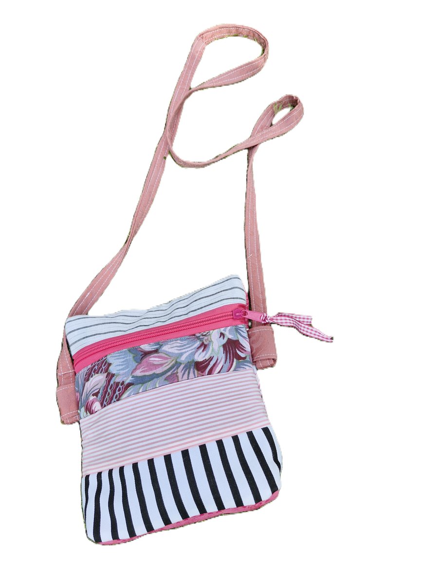 Perfectly imperfect small pink multicoloured striped crossbody bag
