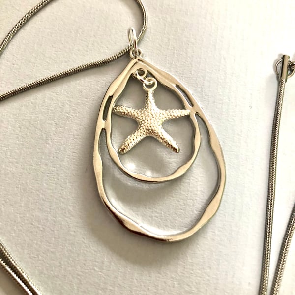 Starfish in teardrop pendant 