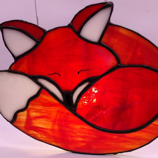 Hand made stained glass, sleepy red fox