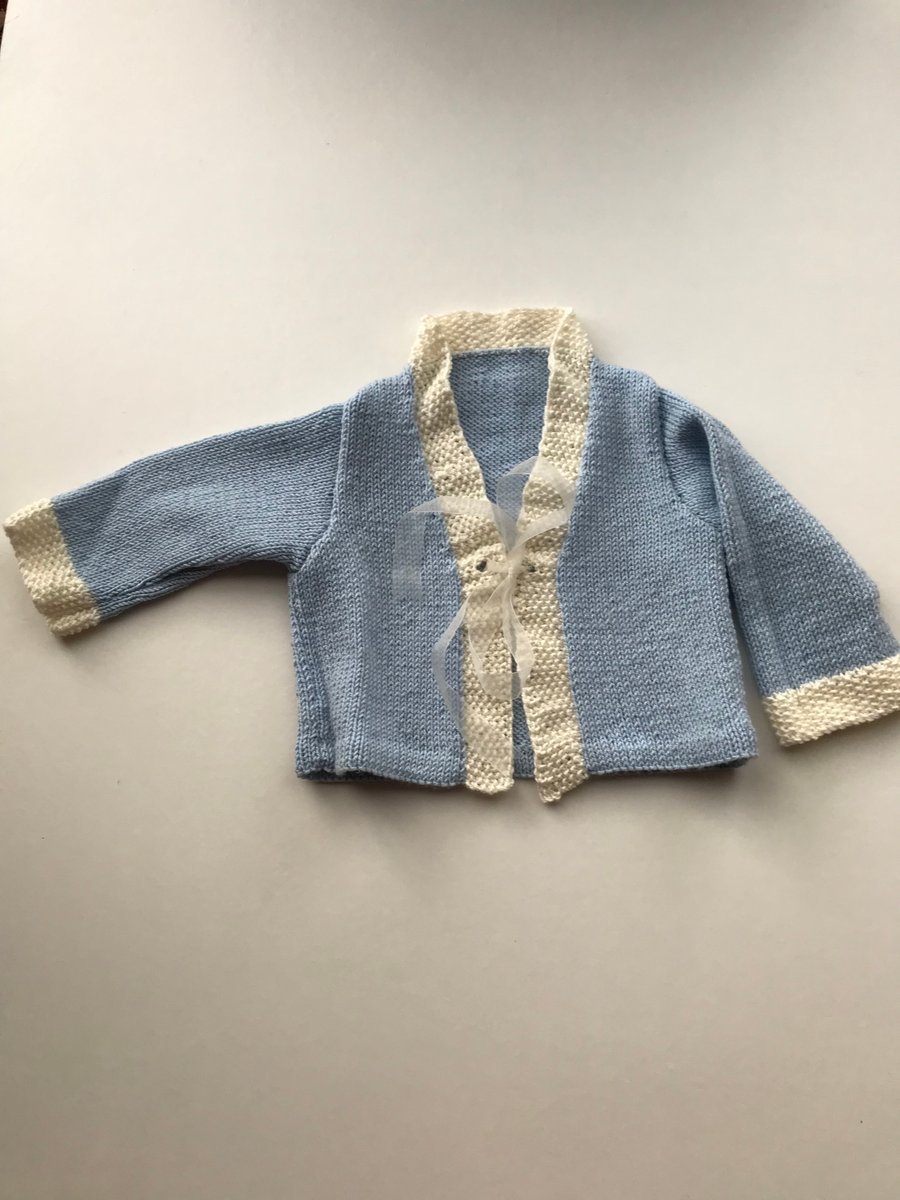 Pretty hand knitted baby cardigan