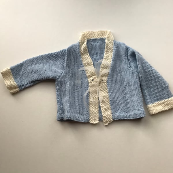 Pretty hand knitted baby cardigan