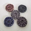 Set of five little handmade ceramic buttons in purples and blues