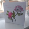 Pink embroidered flower birthday card