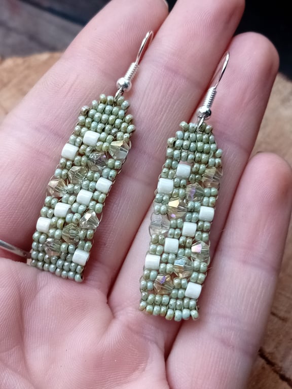 Sage green and cream glittering dangle earrings