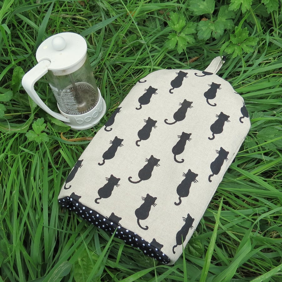 Cats.  A coffee cosy, size small.  To fit a 2 cup cafetiere.  Cafetiere cosy.