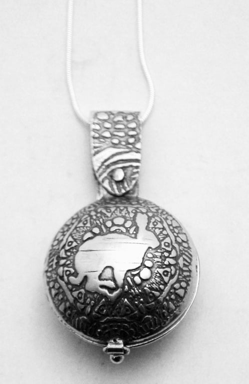 Sterling silver Running Hare locket, swivel design