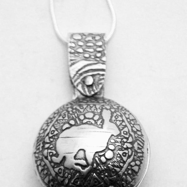 Sterling silver Running Hare locket, swivel design