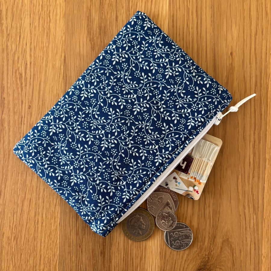 Small zipped fabric coin purse, pouch, in navy and white floral pattern