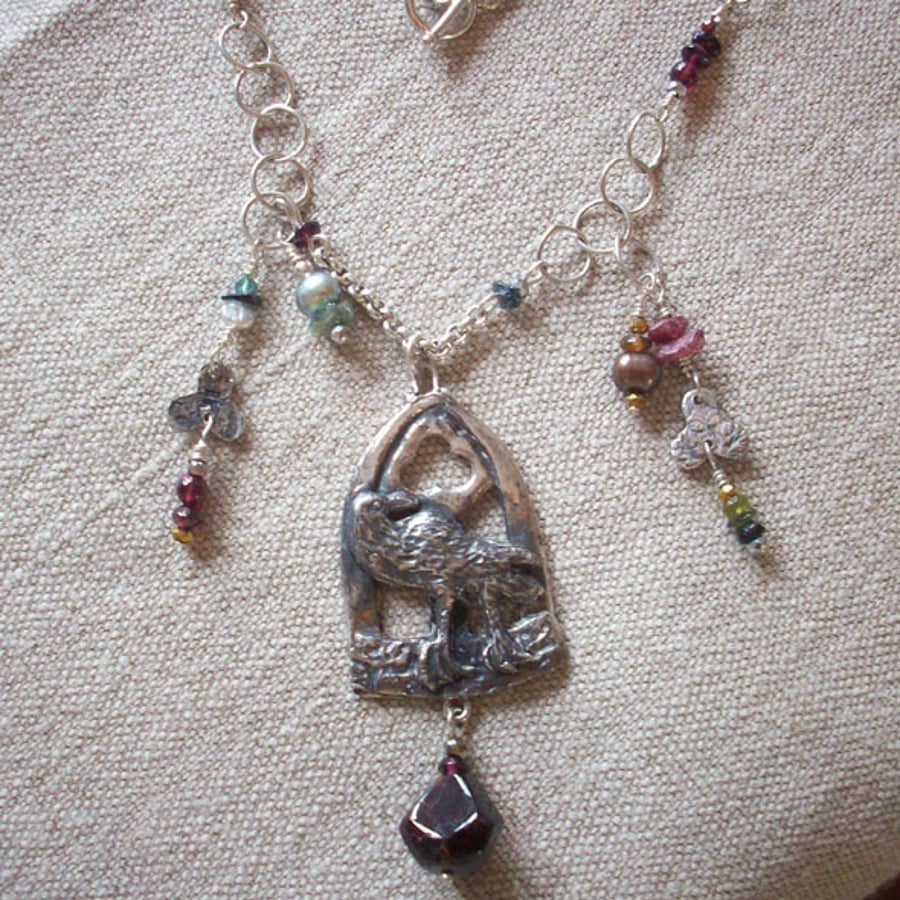 Mediaeval Raven with Garnet and Tourmaline