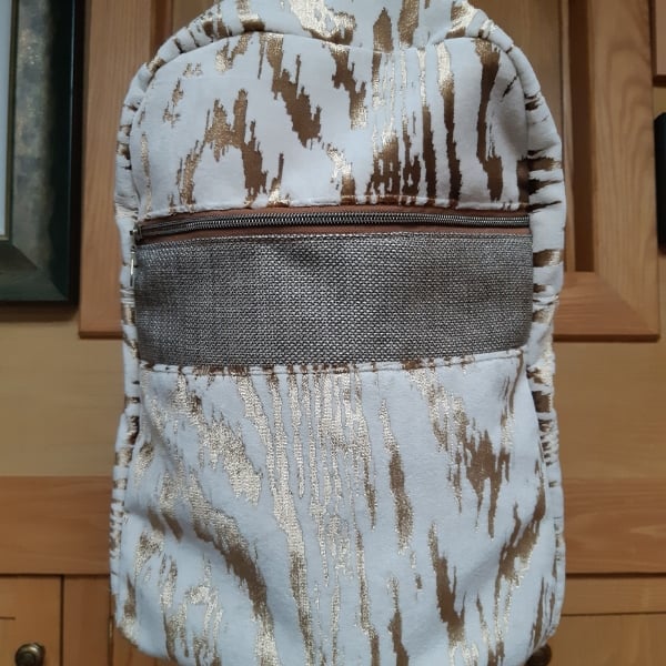 Gold and cream velvet backpack