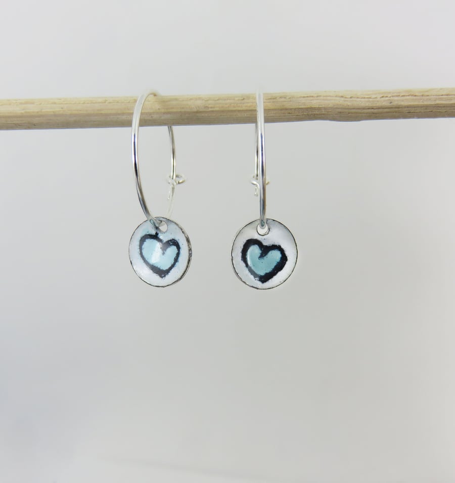 Silver Hoops with Hand Drawn Heart in Enamel on a Silver Disc.