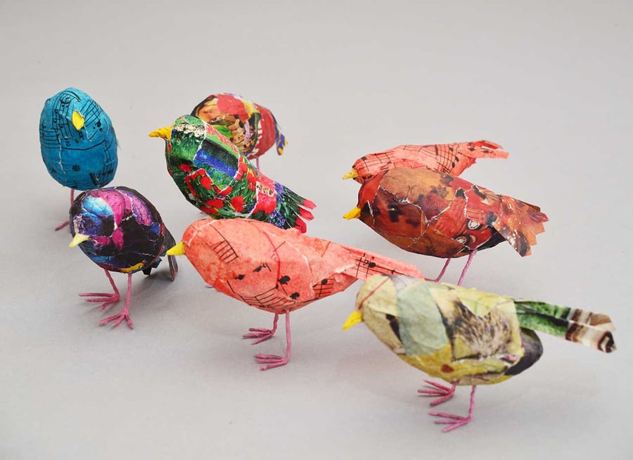Teeny Tiny recycled papier mâché birds in colourful plumage.