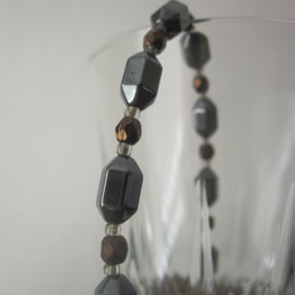 Hematite & Czech Fire Polished Glass Bead Bracelet.