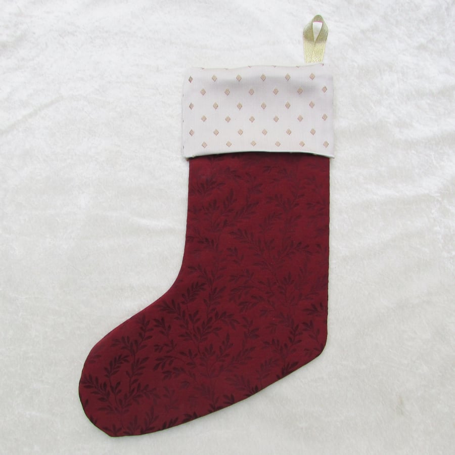 Large dark red and pale gold Christmas stocking
