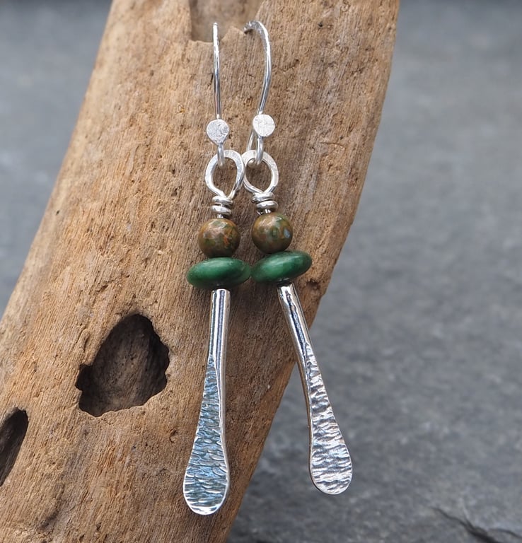 Forged silver rod dangle earrings with Jade and Rhyolite beads.